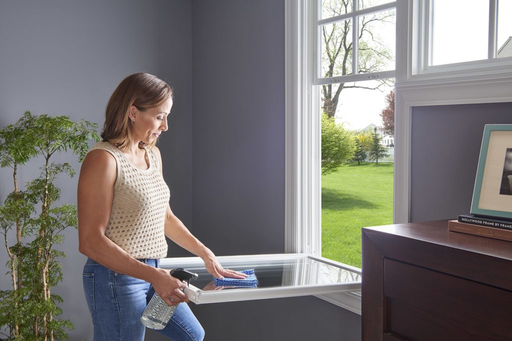 Cleaning double hung window